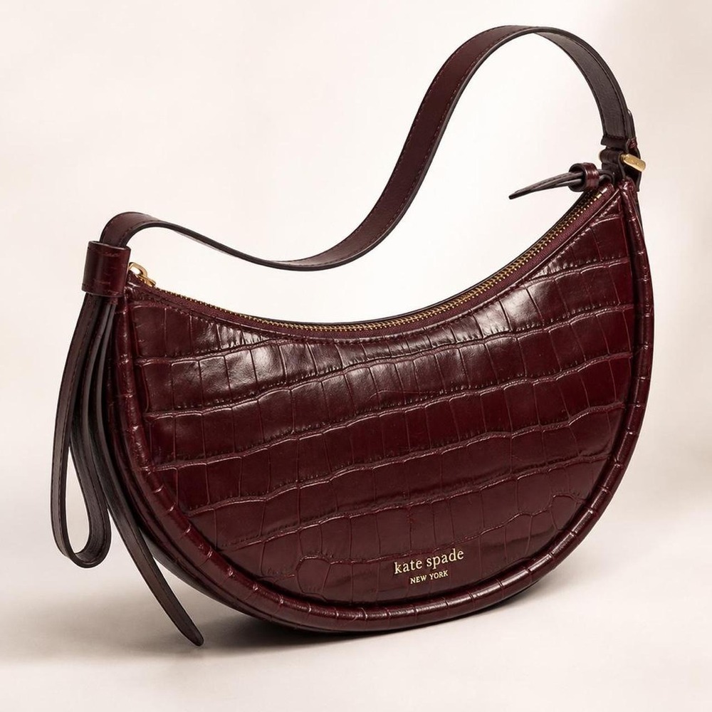 Kate Spade New York burgundy crocodile textured leather handbag